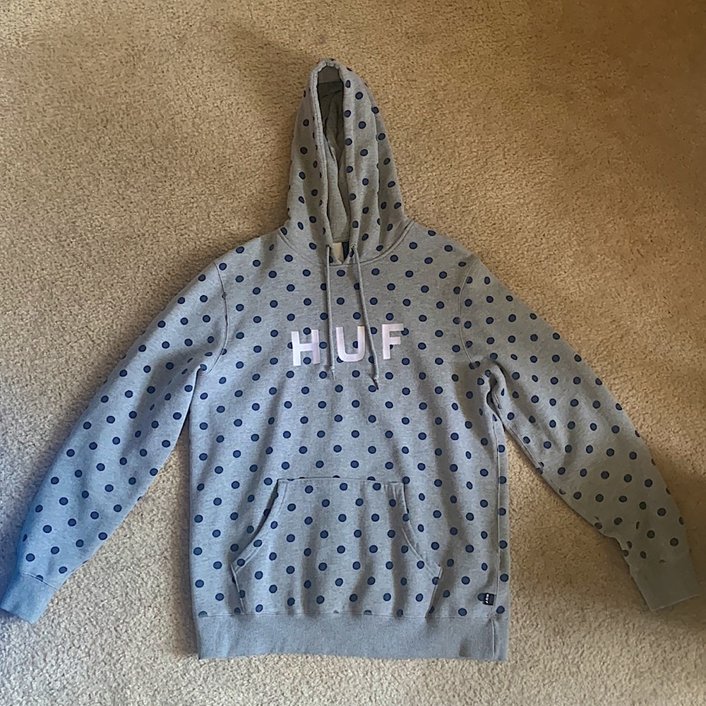 Grey HUF hoodie with white stitched letters and navy blue polka dot pattern